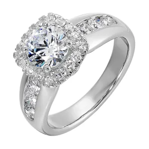 Channel set diamonds wrap this glamorous ring with an addition of cushion halo and solitaire center.