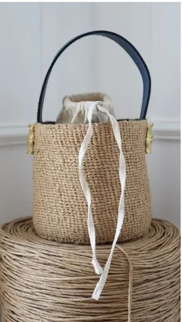 JIAMINI Kaleche Bucket Bag with Jiamini’s bold design