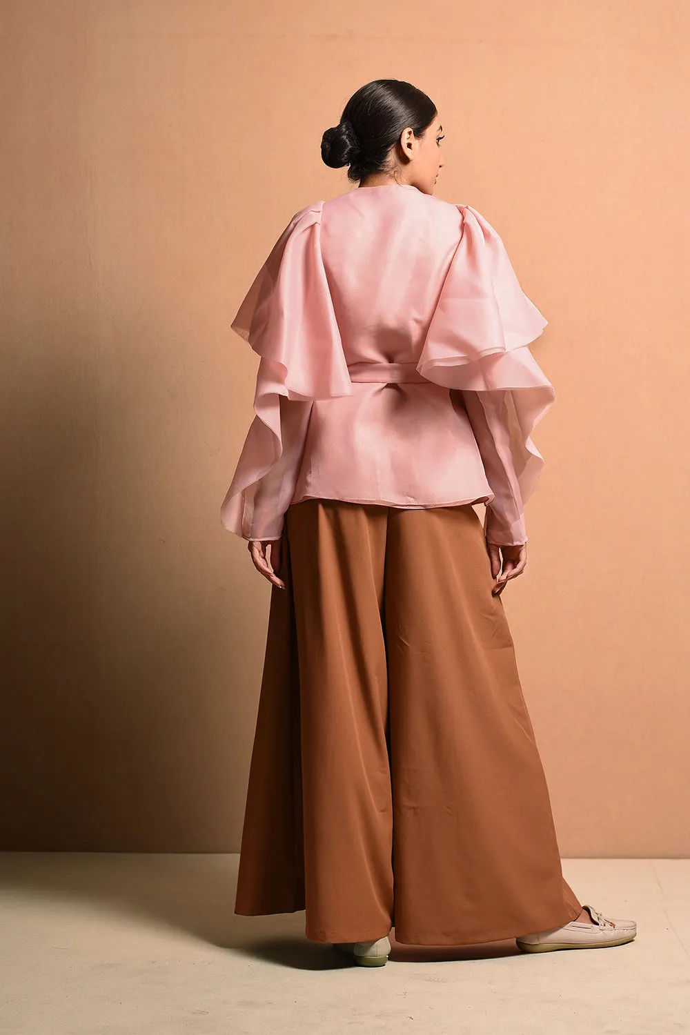 Ruffledtwig Top With Exagerated Symmetrical 
Ruffle Details With Embellished Twig Details.