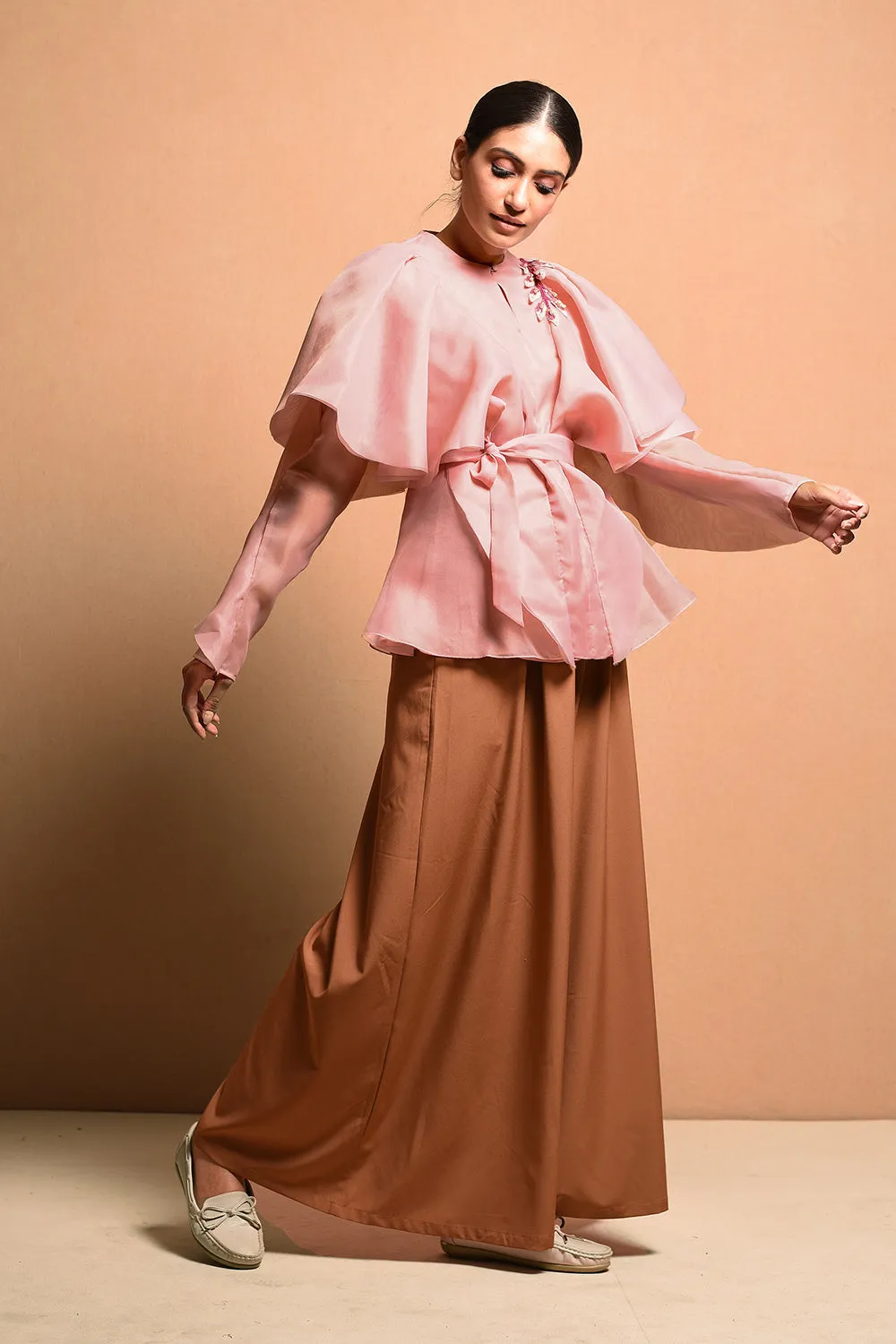 Ruffledtwig Top With Exagerated Symmetrical 
Ruffle Details With Embellished Twig Details.