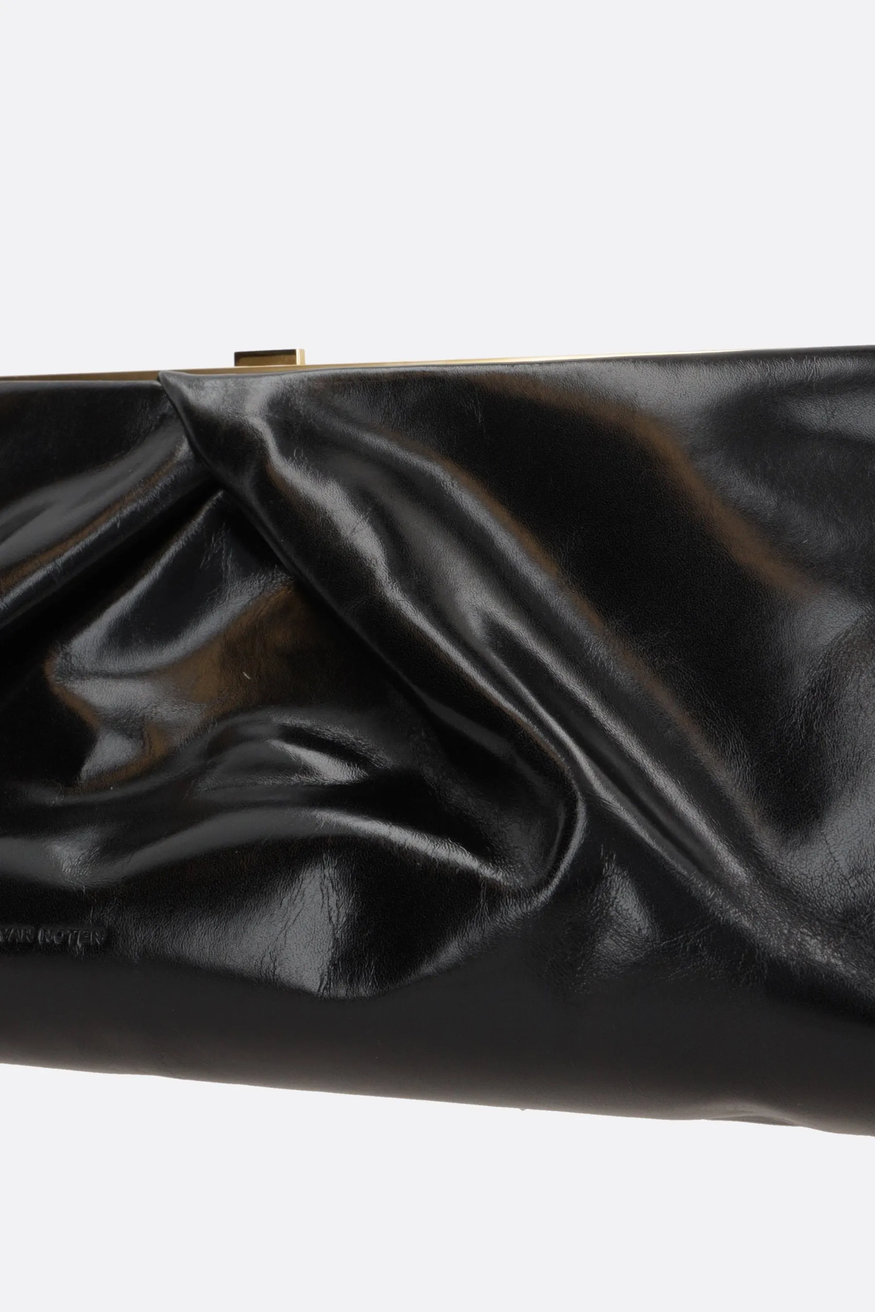 shiny leather clutch with draped details