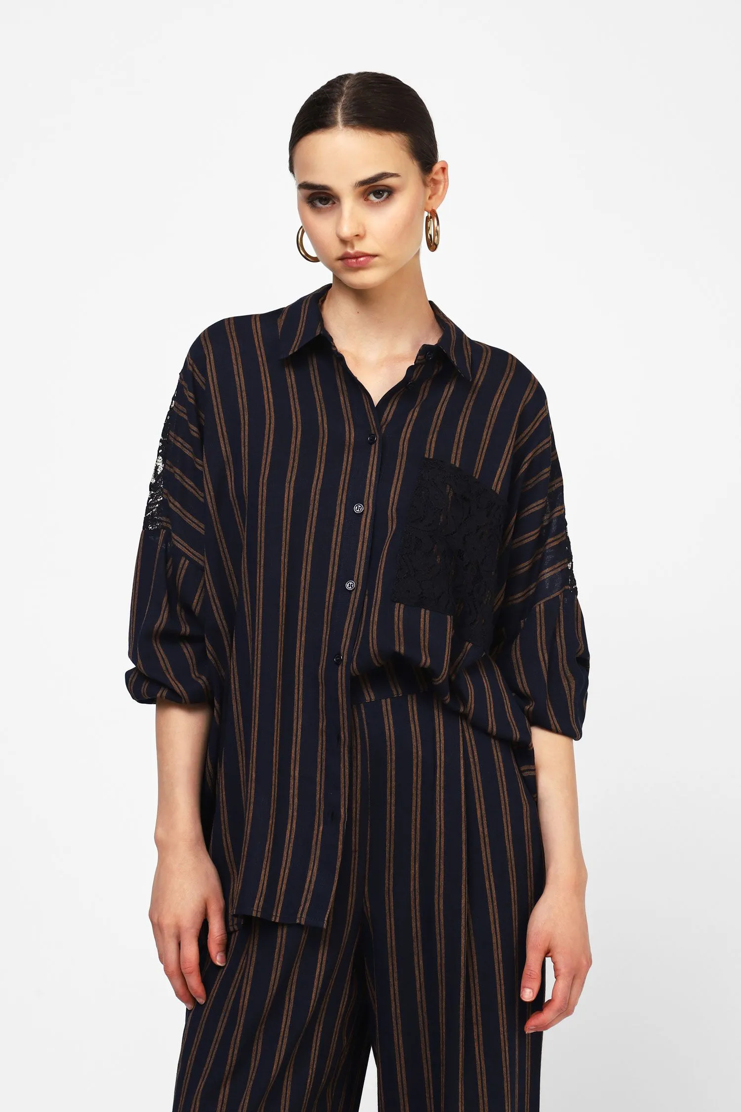Striped shirt with lace details